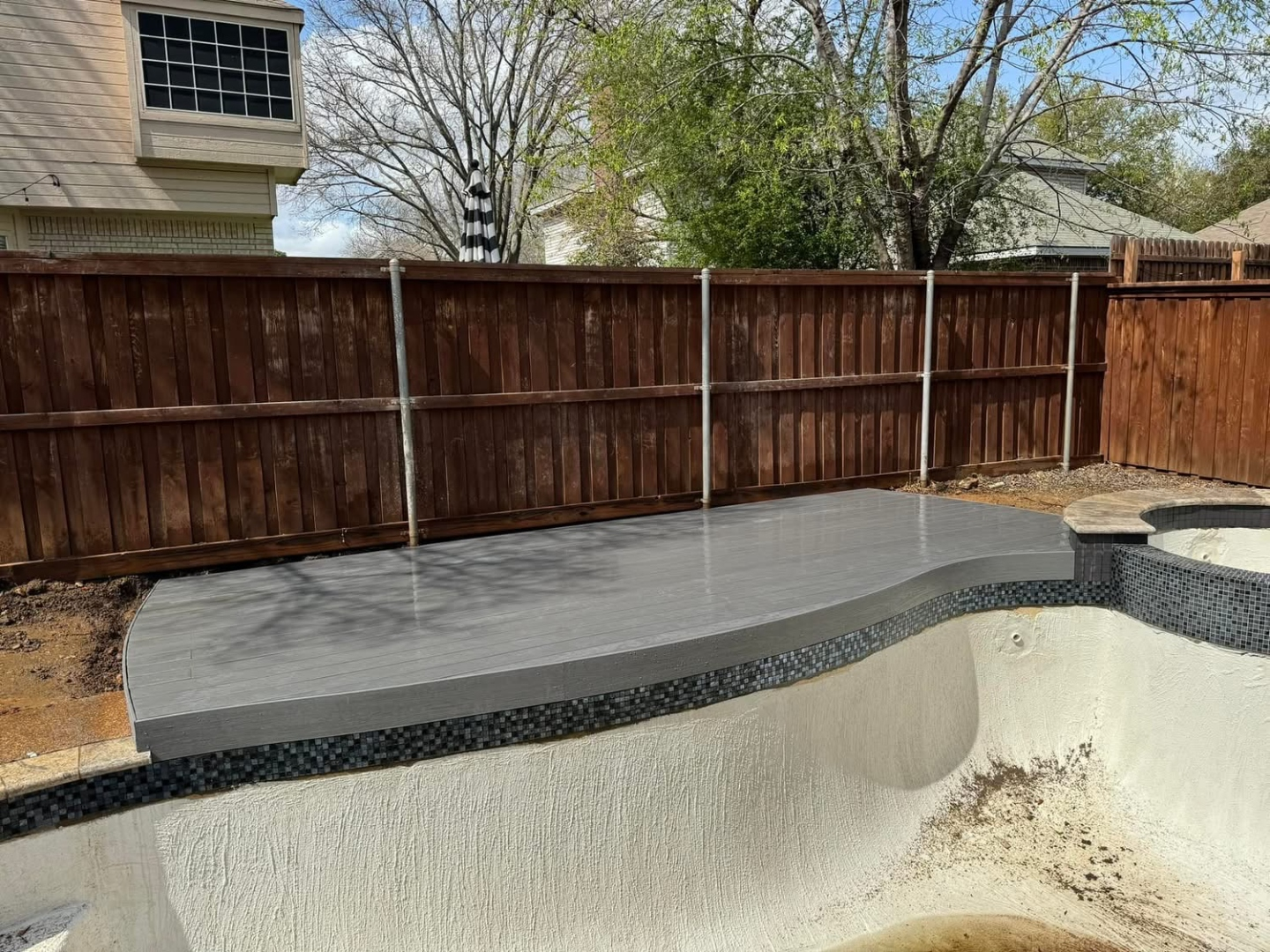 Pool deck resurfacing and hardscape transformation